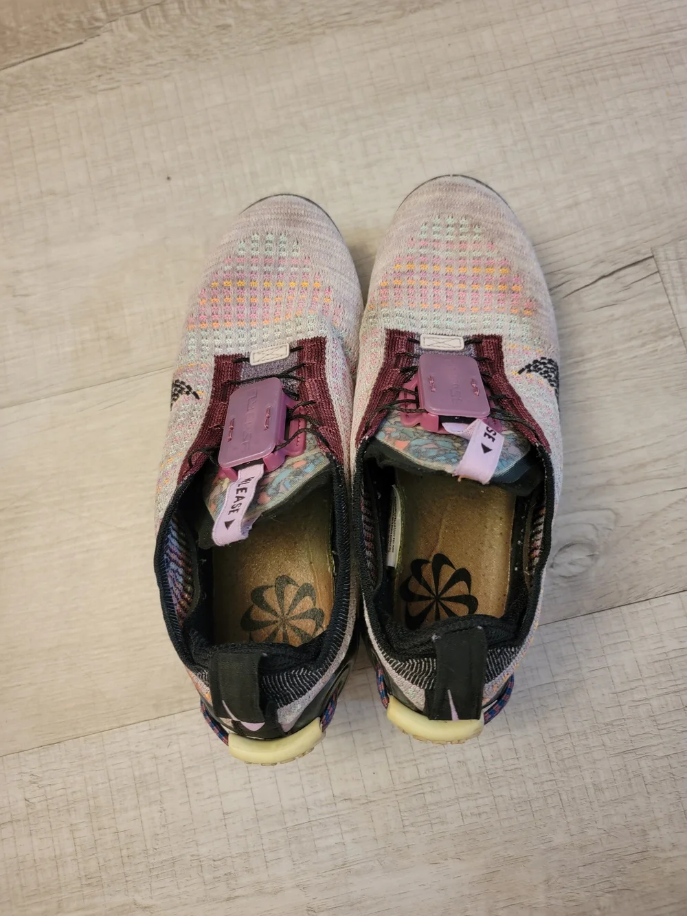Nike Multicolor Flyknit Sneakers with Pink Accents